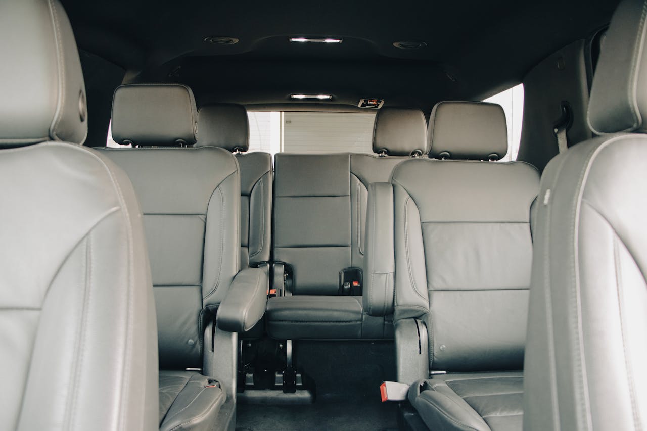 creative Explore the luxurious empty leather seats of a modern car interior, showcasing spacious design and comfort.